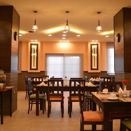 Tilal Almadina Hotel & Suites Амман Экстерьер фото