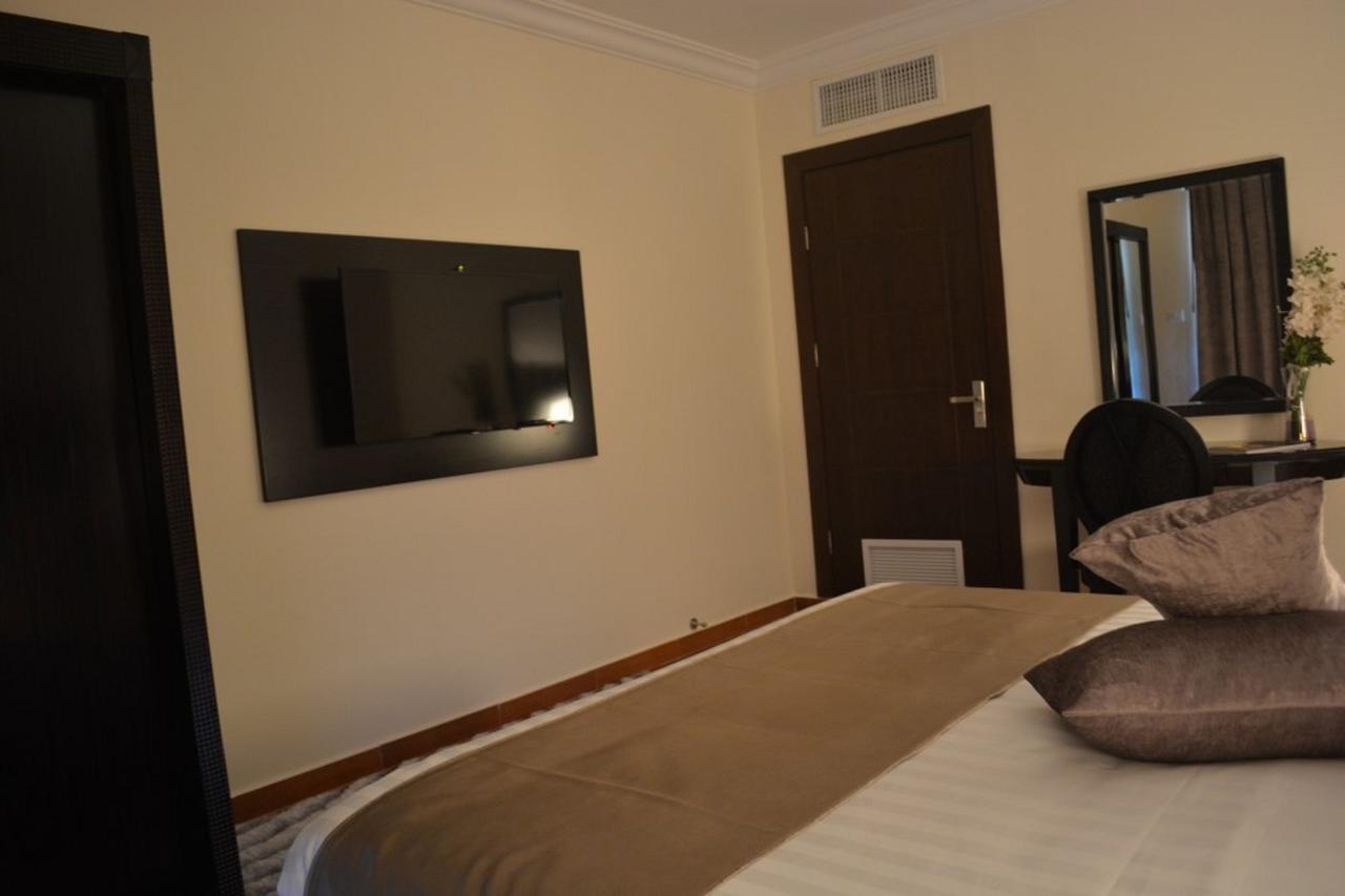 Tilal Almadina Hotel & Suites Амман Экстерьер фото